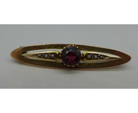 A 9ct gold, garnet and pearl brooch, 1.9g