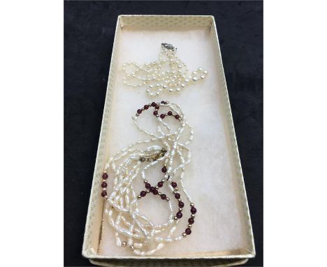 2 pearl necklaces 