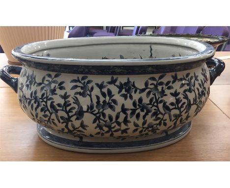 Large blue and white floral ceramic foot bath planter,