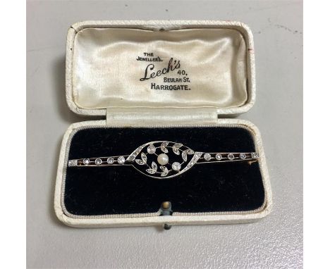 Art Deco Diamond and Pearl Brooch set in yellow metal measures approx 6.1cm long weight 4.2g