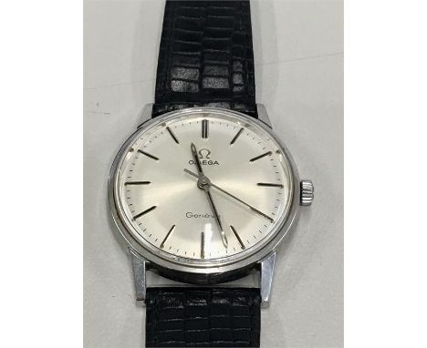 Vintage Omega Geneve Seamaster  stainless steel case watch winds and ticks but no warranty given 