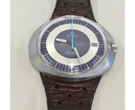 Vintage Omega Geneve Dynamic stainless steel case watch winds and ticks comes on old leather omega strap but no warranty give