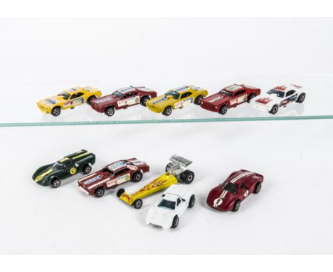 HotWheels Redline 6409 Snake, three examples, one white, two yellow, with 6410 Mongoose (3), Lola GT70, Ford Mk.IV, Ford J-Ca