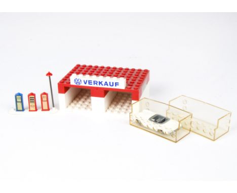 Lego  twin garage with two clear display bricks and set of pumps, with Mercedes Benz 190SL, F-G, car lacks windscreen and ste