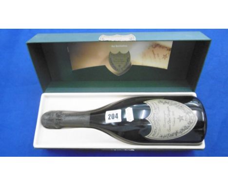 A BOXED BOTTLE VINTAGE DOM PERIGNON 1995
