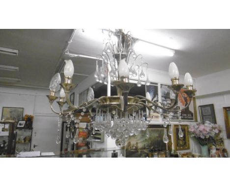 A 10 BRANCH LIGHT FITTING AND WALL LIGHTS
