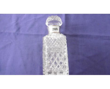 CRYSTAL DECANTER WITH A SILVER COLLAR