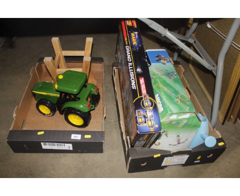 A box containing Grand Illusions magic game, K'nex model building set, a toy John Deere tractor etc