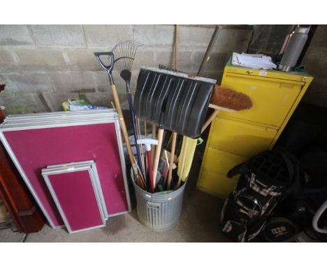 A galvanised dustbin and contents of various tools to include snow shovel, brooms, kneeling pad, shears, rake etc.