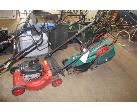 A Champion rotary lawn mower with Briggs & Stratton 148cc engine