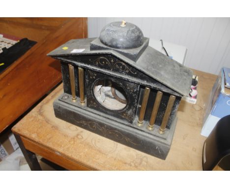 A Victorian black marble clock case
