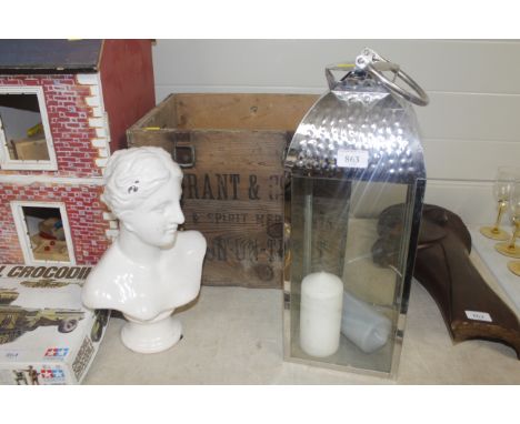 A candle lantern, an advertising box for B Grant and Co Ltd wine and spirits merchants and a pottery bust