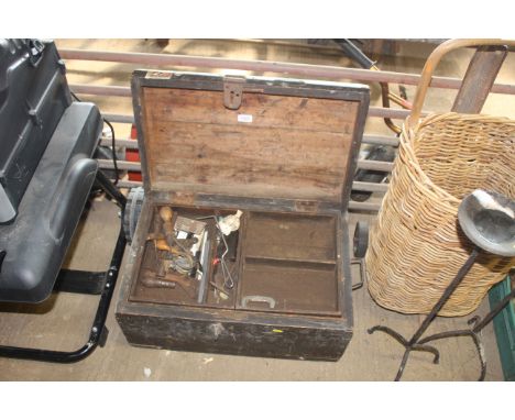A wooden carpenters tool box and contents of various tools