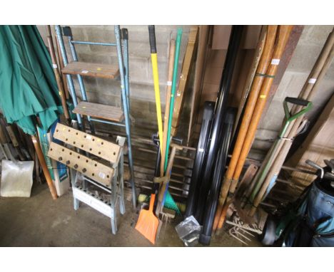 A quantity of tools to include shovel, broom, digging fork etc.