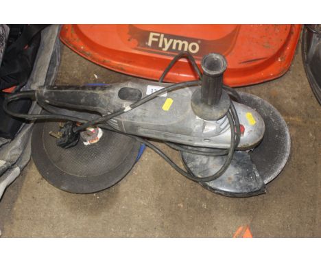 A Performance Power FTMC230AG angle grinder with spare cutting disks
