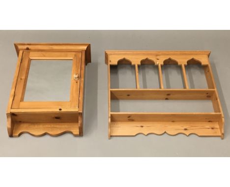 A pine hanging shelf and a pine hanging cabinet