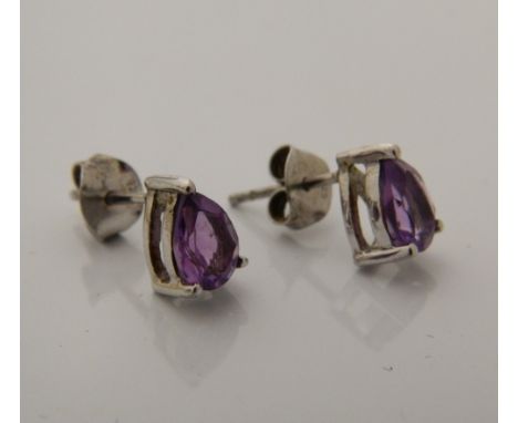 A pair of silver and amethyst earrings