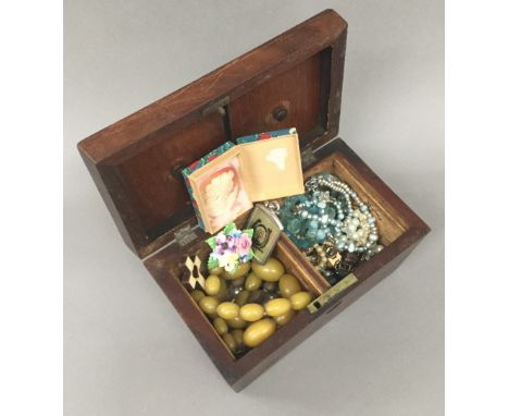 A tea caddy containing a quantity of miscellaneous costume jewellery, etc.