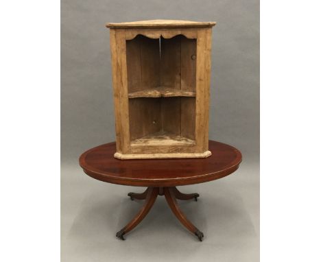 A pine hanging corner shelf and a reproduction coffee table