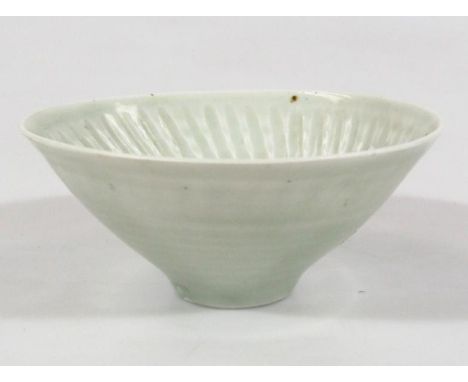 A Marianne De Trey Studio porcelain bowl, of circular outline with a cut decoration to the centre, on circular foot, 12cm dia