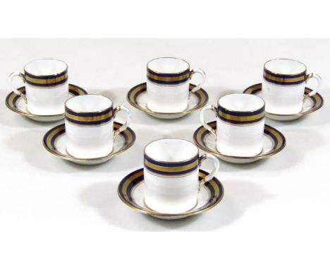 An early 20thC Royal Albert crown china coffee can set, comprising cans, 6cm high, and saucers in blue and gilt highlights, p