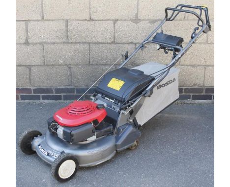 A Honda HRD 535 100 rotary mower, with grass box, approx 50cm wide cut.
