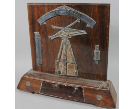 An unusual rosewood and raised metal power Switchgear Ltd scientific award, of shaped outline, raised with scientific instrum