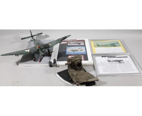 Various aeronautical related collectables, ephemera and effects, comprising an engine part from a JU.87 model, mounted on a p