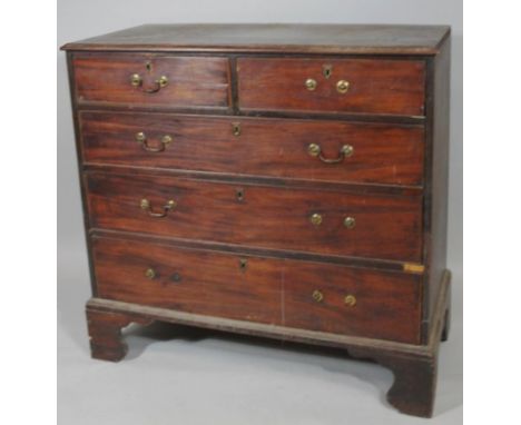 A George III mahogany chest, of two short and long cockbeaded drawers, on bracket feet, 103cm high, 108cm wide, 55cm deep. (A