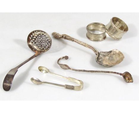 An elaborate silver naturalistic spoon, by E C, with shaped bowl and handle, 19cm wide, a small quantity of other silver flat