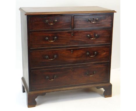 GEORGE III MAHOGANY CROSS BANDED CHEST, moulded top above five graduated drawers, bracket feet, 96 x 49 x 99cms