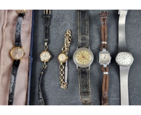 A WWII era Pierce stainless steel manual wind wristwatch, 32mm, Ref. 31179, together with a small group of wristwatches. (9) 