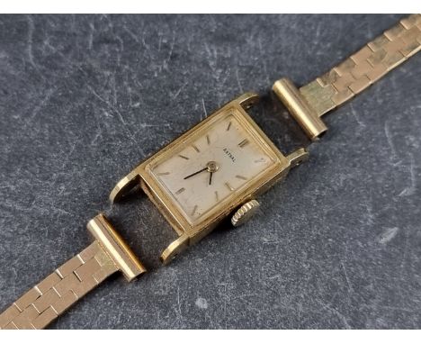 A vintage Astral yellow metal manual wind ladies wristwatch,&nbsp;13mm, stamped '18k', with 9ct gold bracelet hallmarked Birm