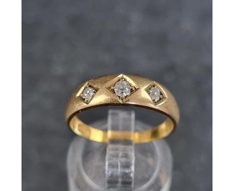 A Victorian 18ct gold diamond three stone gypsy ring, set three old cut diamonds, Birmingham 1888, size O, gross weight 3.6g.