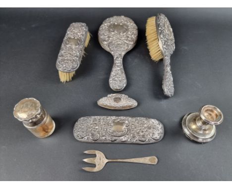 A silver mounted four piece dressing table set,&nbsp;by&nbsp;A &amp; J Zimmerman Ltd, Birmingham 1905/6, (one item is mount o