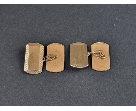 A pair of 9ct gold engine turned cufflinks, Birmingham 1950, 3.3g. 