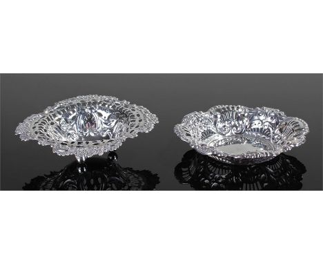 Two silver bonbon dishes, the first Birmingham 1897 with a pierced gallery boarder, together with another, marks rubbed with 