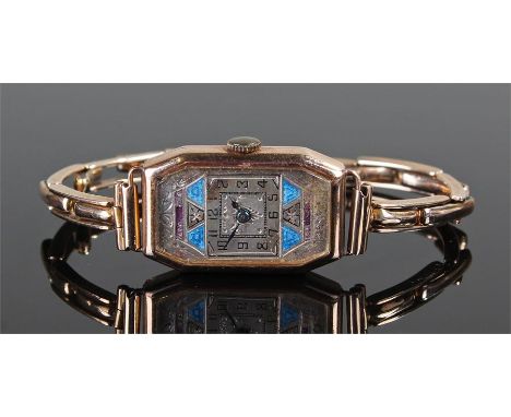 9 carat gold ladies wristwatch, the rectangular shaped silvered dial with blue and purple enamel decoration, manual wound, Ar