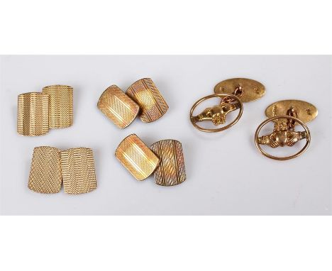 Three sets of cufflinks, to include a 9 carat gold Claddagh example, a 9 carat gold engine turned example and a gold on silve