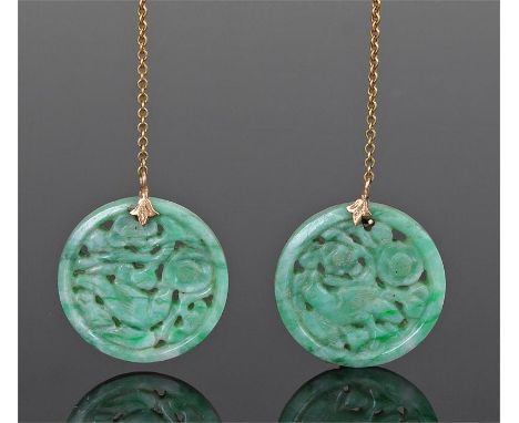 Pair of Chinese jade earrings, the yellow metal chain and mount with a green jade foliate and bird circular discs, 25mm wide