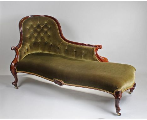 Victorian mahogany chaise lounge, the curved button back with moulded frame, stuff over serpentine seat raised on cabriole le