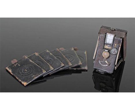 The Sprite miniature folding plate camera in the original leather case with six plates