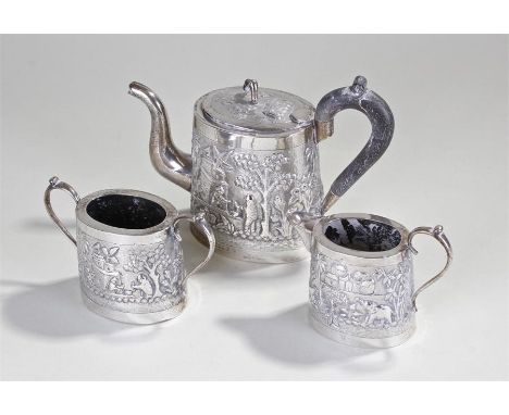 Delhi Durbar 1911 interest, an Indian white metal three piece tea service, to include the teapot, milk jug and sugar basin, e