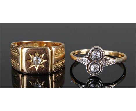 Two 18 carat gold rings, the first with an over and under diamond set head, ring size M 1/2, the second ring with central dia