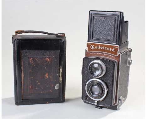 Houghtons of London plate camera, together with a Rolleicord f = 7.5cm, (2)