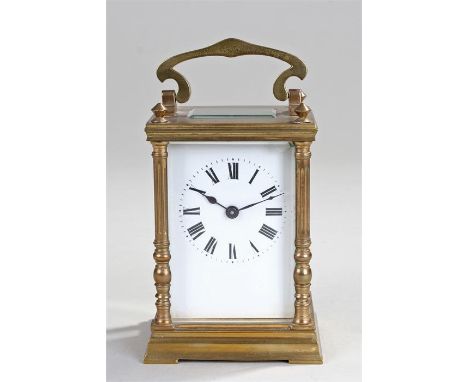 French gilt brass carriage clock. The case with fluted columns and five glass case, white enamel dial with Roman hours, lever