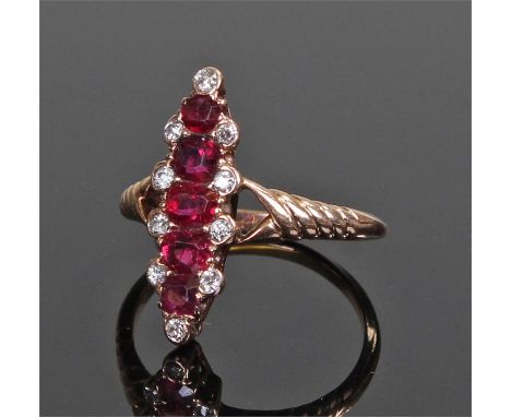 Unusual 18 carat gold diamond and ruby set ring. With a vertical row of diamond and rubies, the rubies at approximately a tot