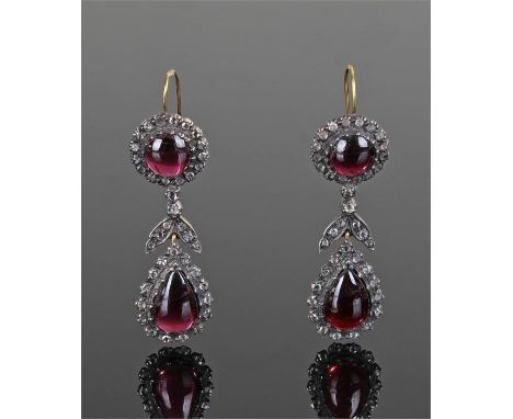 Pair of George III garnet earrings, the pair garnet drop surrounded by diamonds, with a leaf link and further garnet to the t