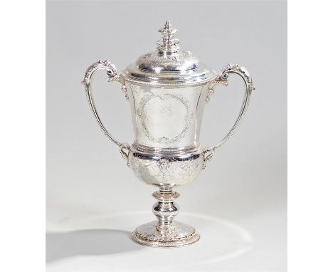 Impressive George V silver trophy, London 1930, maker Adie Brothers Ltd. The large trophy with finial top above scroll suppor