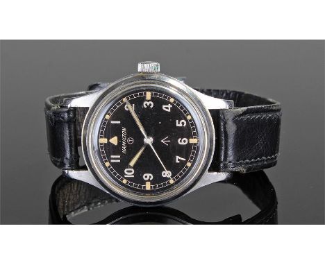 Hamilton military stainless steel wristwatch. The black dial, illuminated batons and Arabic numerals in stainless steel case 